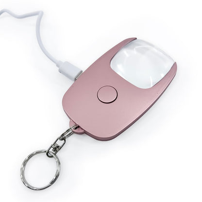 Byzantium Eleusis Pocket Zoom™ Recharge mini magnifier with LED light showing a compact, portable handheld device with built-in illumination.