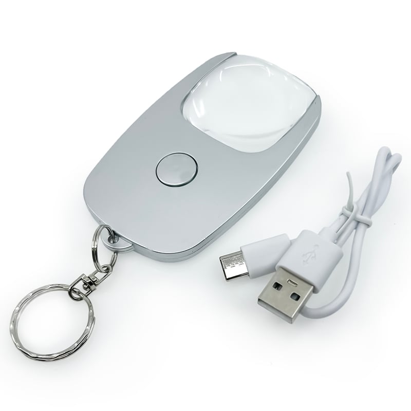 Byzantium Eleusis Pocket Zoom™ Recharge mini magnifier with LED light showing compact design and illuminated lens for close-up viewing.