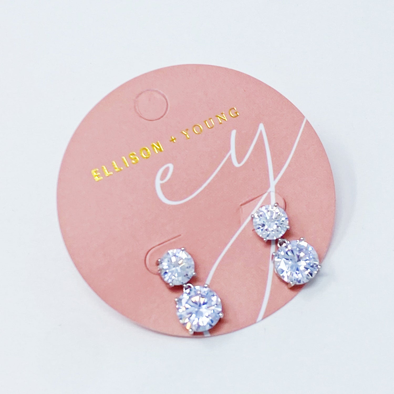 Fuchsia Hercules Double Diamond Dangle Earrings with sparkling gemstone accents and elegant silver hooks.