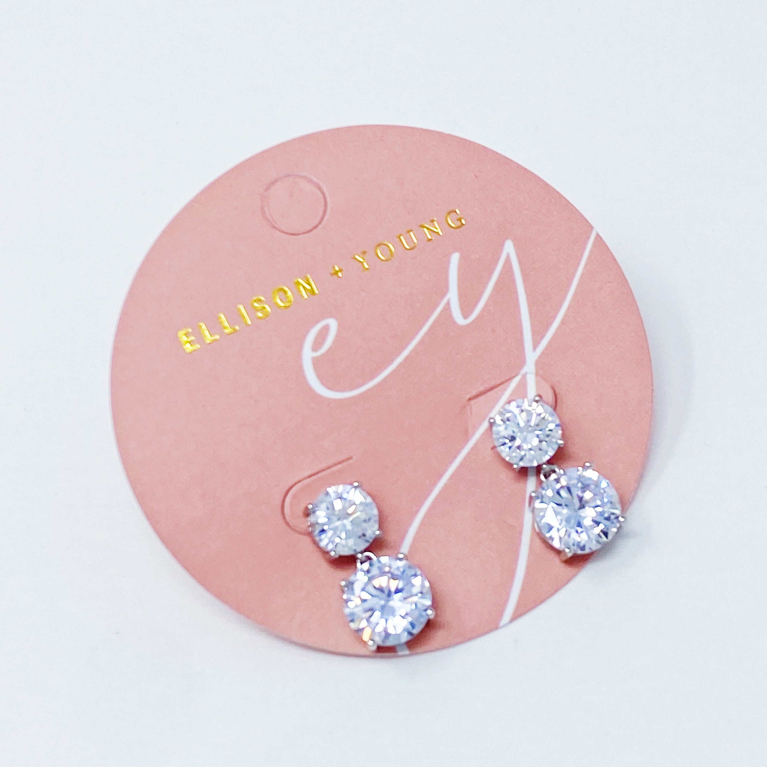 Fuchsia Hercules Double Diamond Dangle Earrings with sparkling gemstone accents and elegant silver hooks.