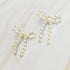 Fuchsia Hercules Pearl Bow Ballerina Earrings with white pearls and delicate bow design, jewelry and watches accessory