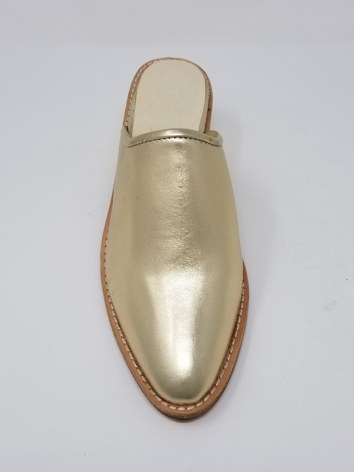 Azure Ophion Foxhill footwear with gold finish, front view showing stylish design and comfortable fit.