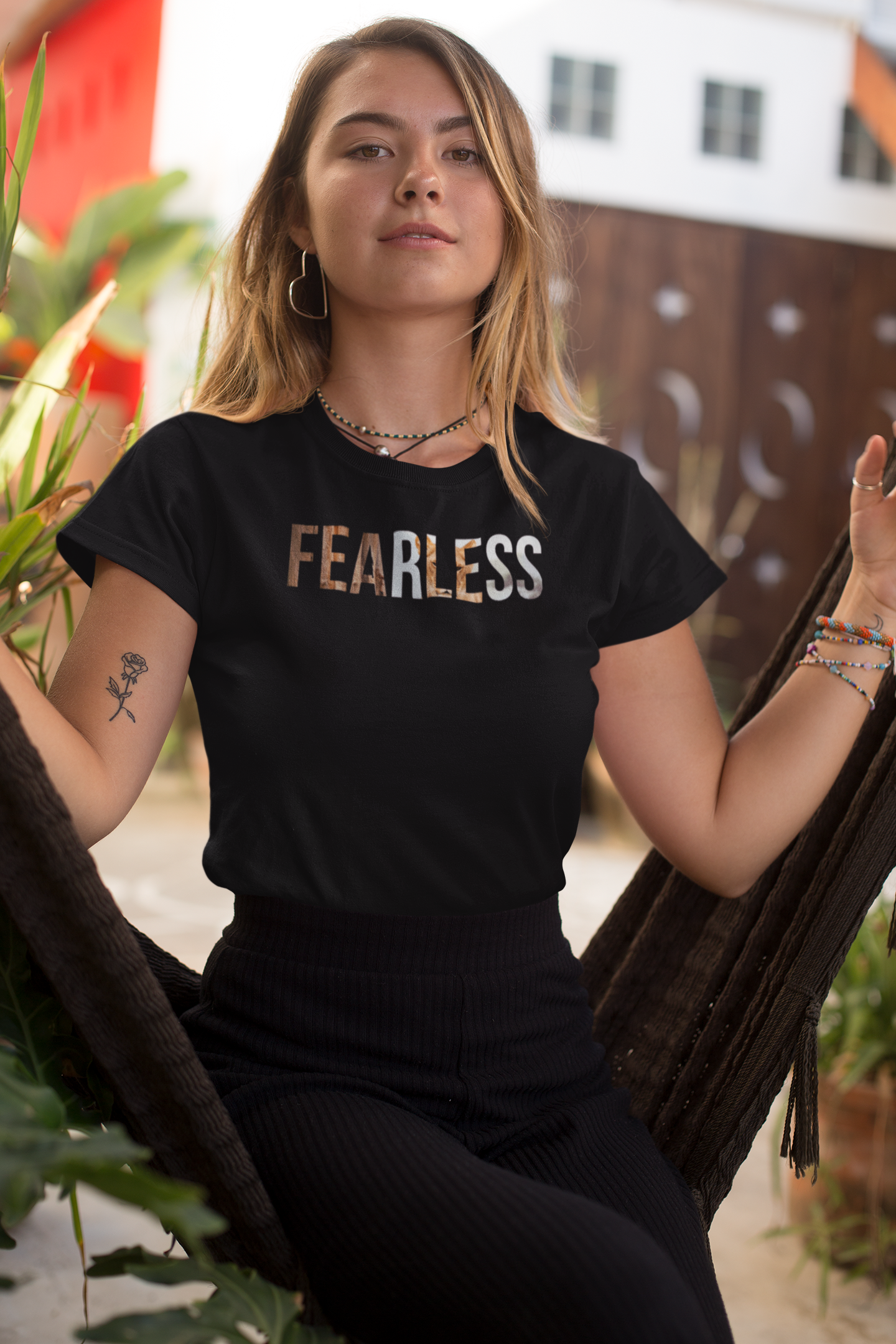 Black Fearless Women T-shirt by Scorpius featuring bold white text and a confident design, casual fit, and soft cotton fabric.