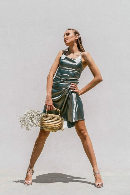 Green satin slip dress for women by Azure Thanatos, featuring a minimal design and elegant fit.