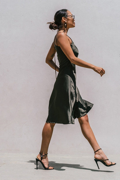 Olive green Florida minimal satin slip dress for women by Azure Thanatos, featuring a sleek, smooth fabric and minimalist design.