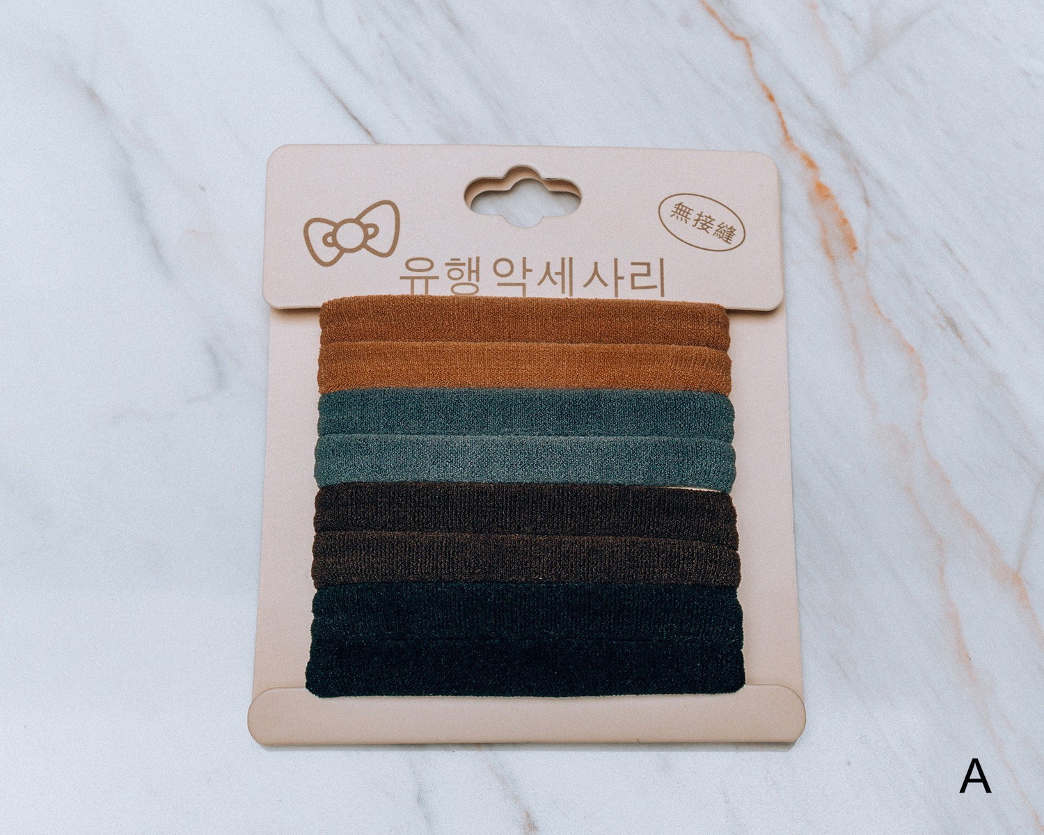 Azure Thanatos Francesca No Pull Hair Scrunchy, soft fabric hair accessory featuring a stylish, gentle grip design for all hair types.