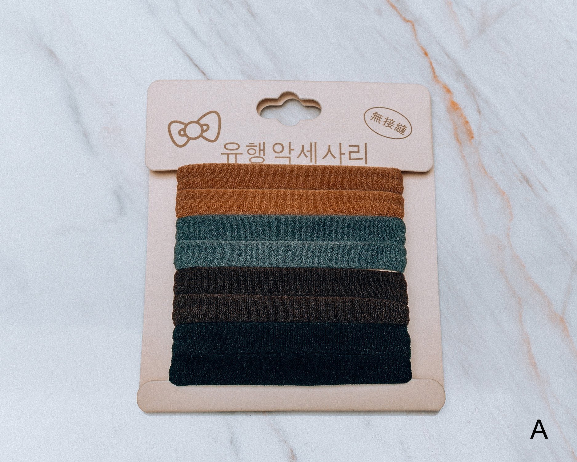 Azure Thanatos Francesca No Pull Hair Scrunchy, soft fabric hair accessory featuring a stylish, gentle grip design for all hair types.