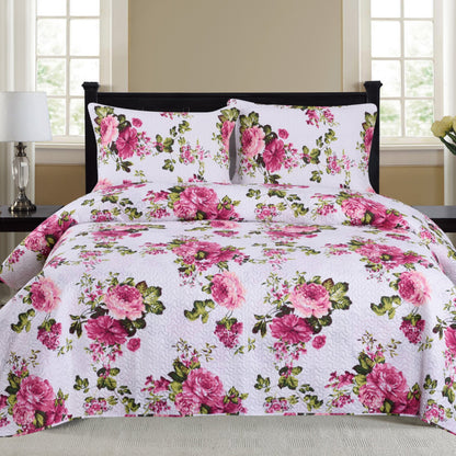 Azure Zeus Cynthia 3-piece quilt set in vibrant fuchsia with matching pillow shams on a bed.