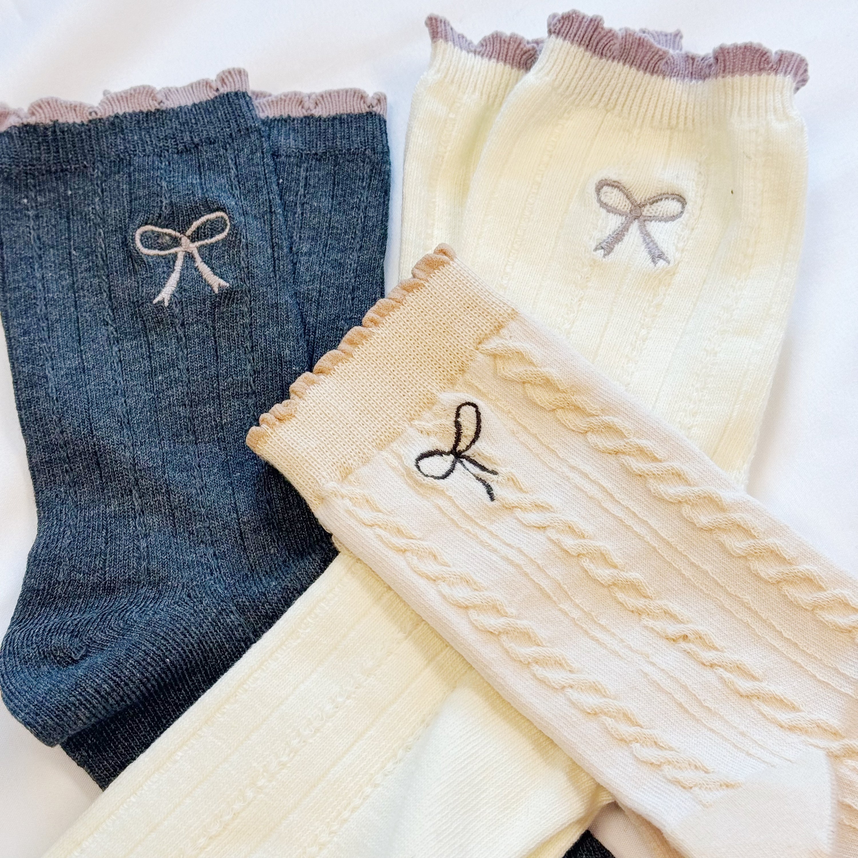 Fuchsia Hercules Bow Bow Socks set of 2 featuring stylish, colorful sock designs with bow accents, perfect for jewelry and accessories.