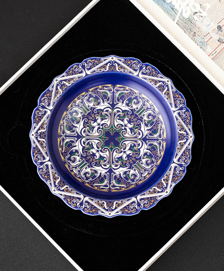 Goseung 999 silver filigree porcelain teapot and saucer set in imperial blue with intricate decorative details.