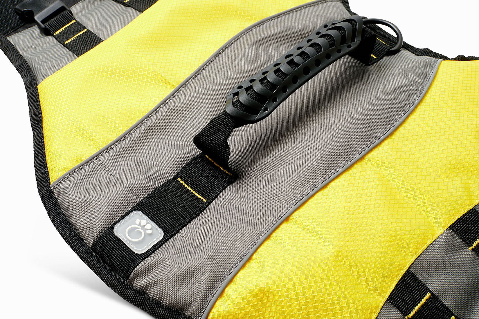 Yellow dog life vest by Beige Antigone with adjustable straps and handle for swimming safety and outdoor water activities.