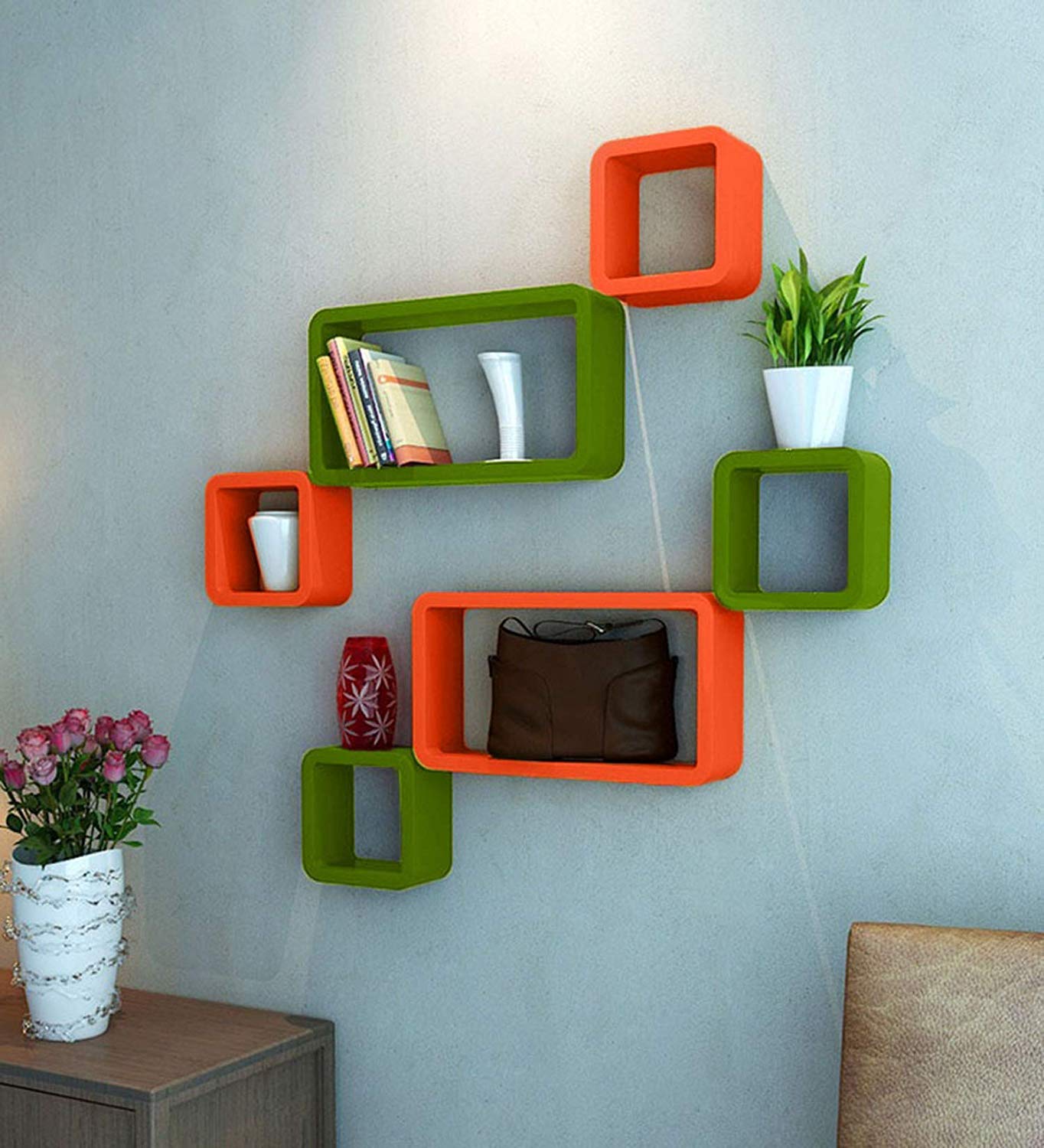 Set of six green MDF wall shelves with cube and rectangle shapes for home decor display and storage.