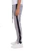 Grey striped tricot track pants by Lime Milo, featuring a relaxed fit and comfortable elastic waistband.