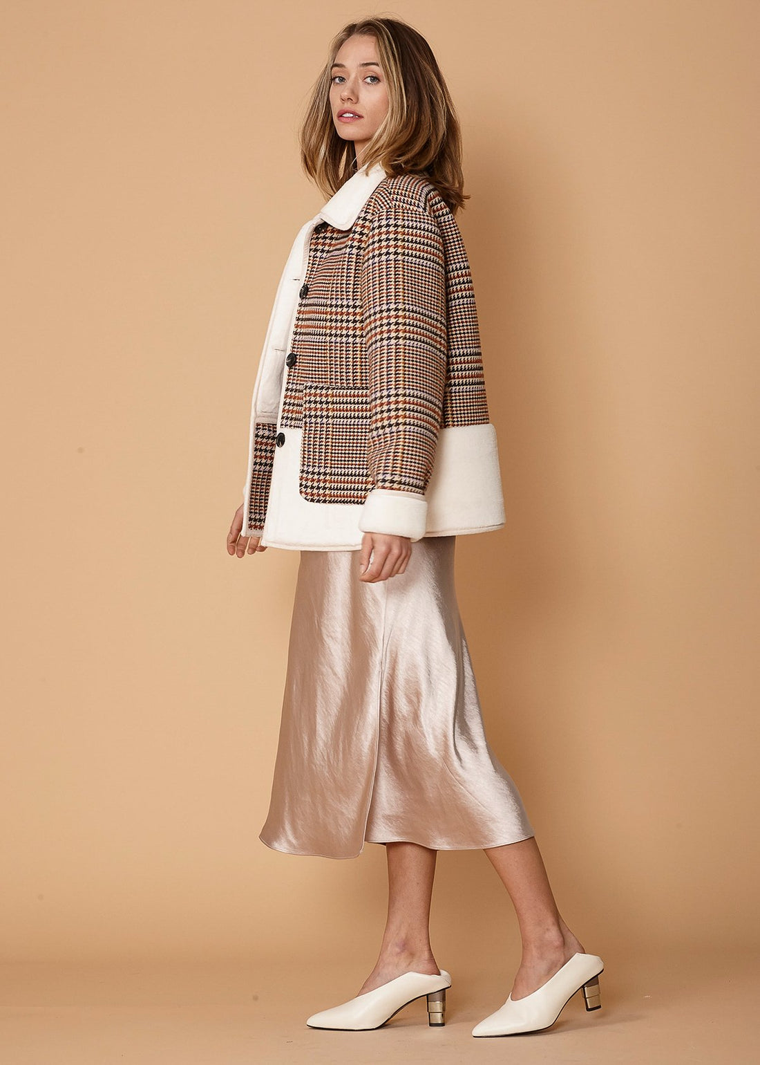 Women’s rust houndstooth plaid fur jacket from Lemon Hera, stylish winter coat with cozy fur collar and classic check pattern.