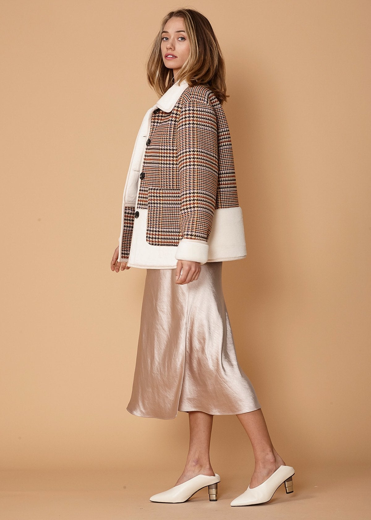 Women’s rust houndstooth plaid fur jacket from Lemon Hera, stylish winter coat with cozy fur collar and classic check pattern.