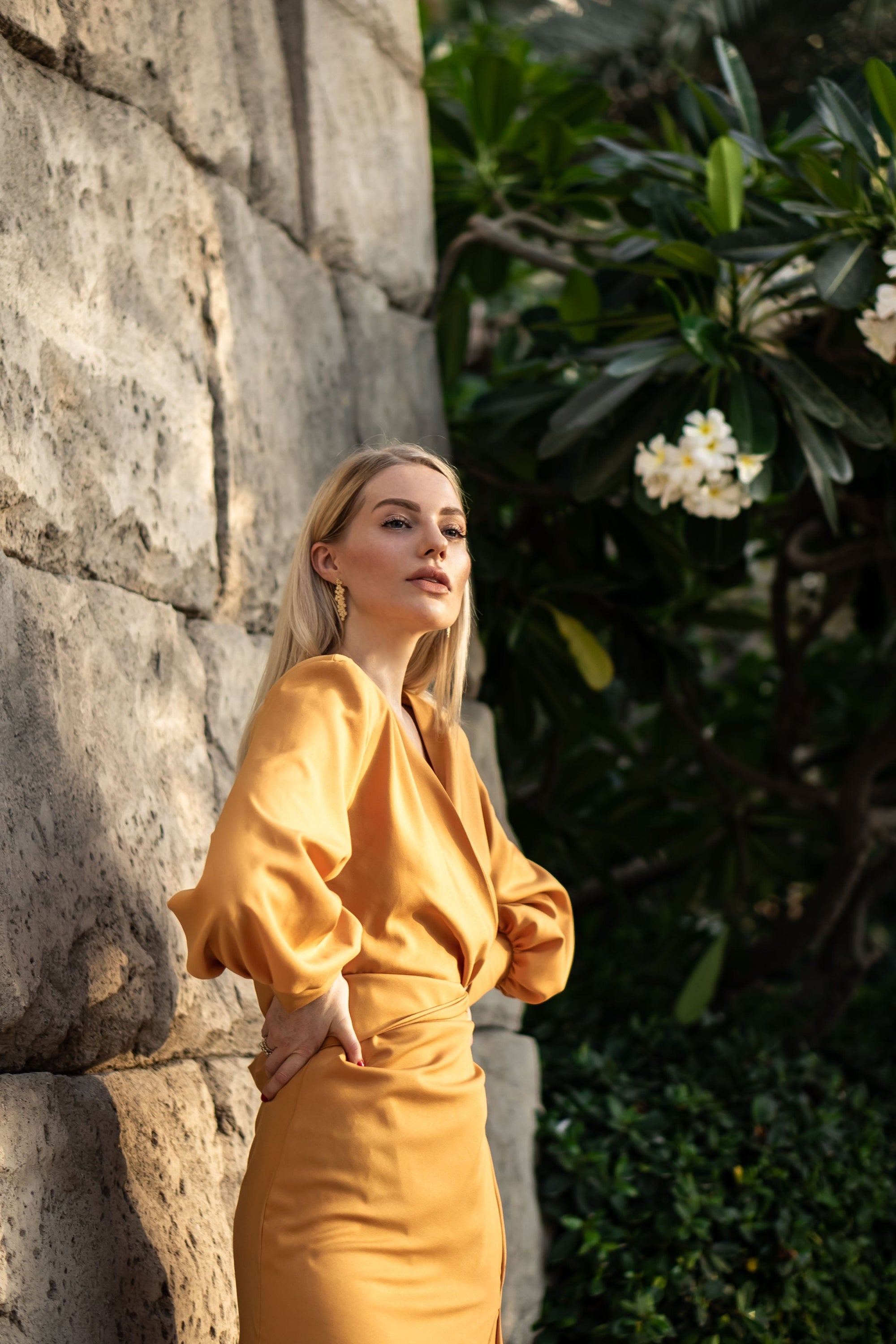 Blush Athena mustard wrap maxi dress with long sleeves and tie waist, displayed on a mannequin.