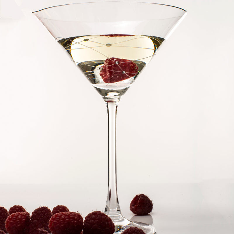 Set of two Crimson Shadow Galaxy Spirals martini glasses with swirling galaxy design, displayed in a gift box.