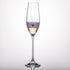 Crimson Shadow pink ribbon champagne glass in a gift box, elegant drinkware for celebrations, close-up of one glass showing pink ribbon design.
