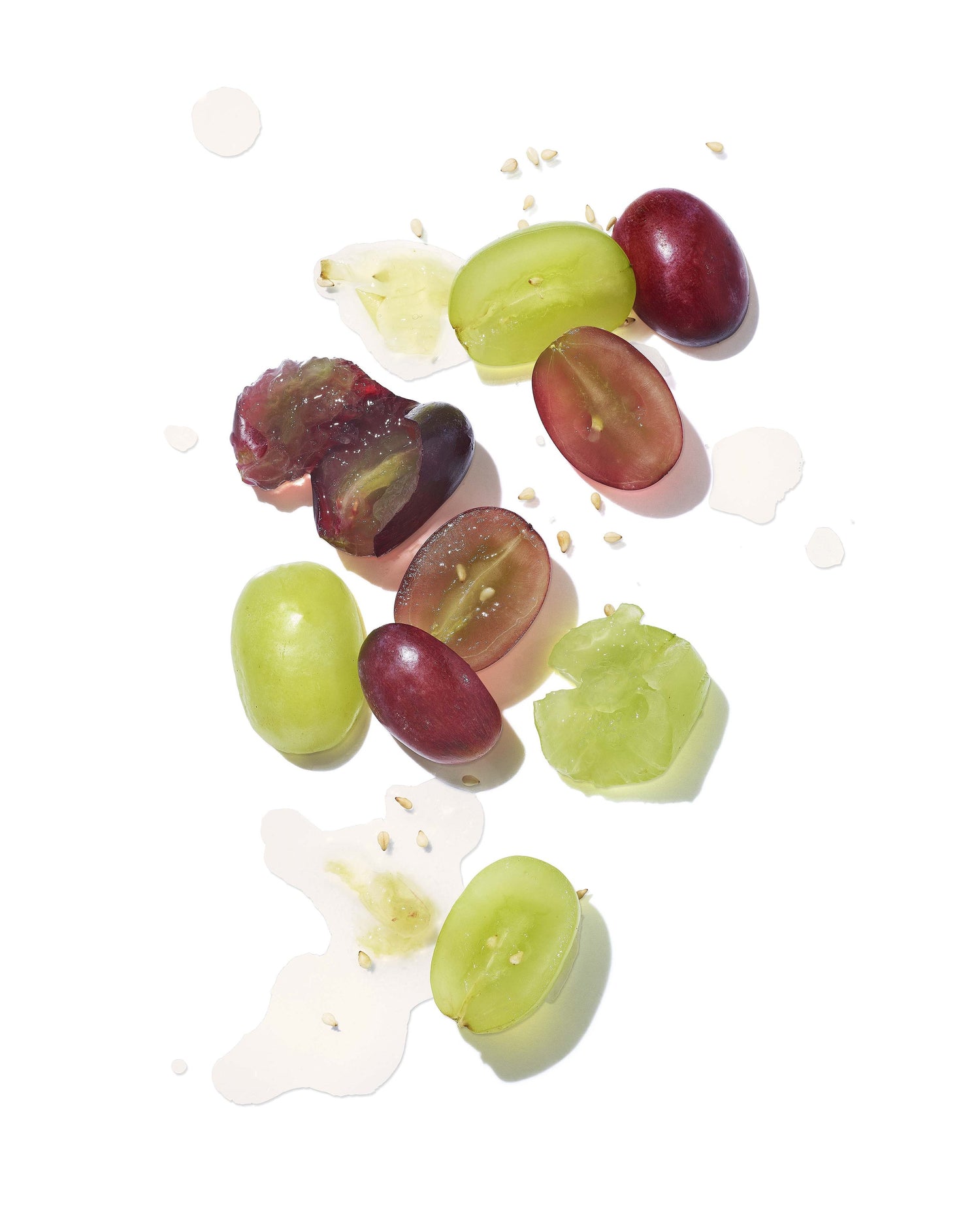 Green Saffron Mekabu hydrating styling cream for hair, shown with grapes, highlighting natural ingredients and nourishing formula.