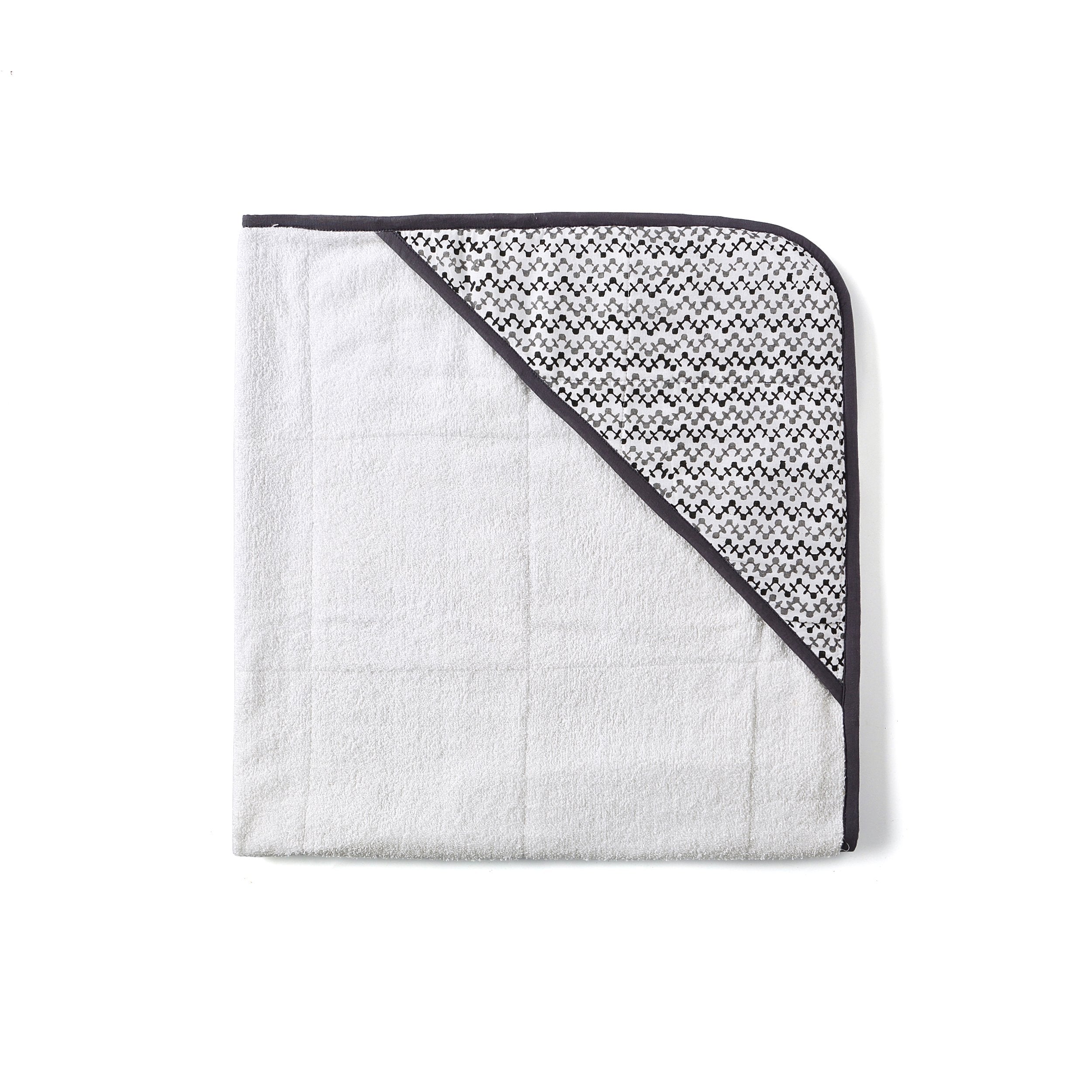 Ivory Meleager Greenwich Towel in Malabar Baby, soft and plush gift towel with intricate woven design and vibrant green color.