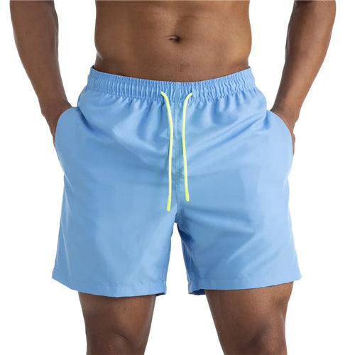 Raspberry Eurybia Sunga Beach Shorts swimwear with vibrant pattern and comfortable fit, designed for beach and poolside wear