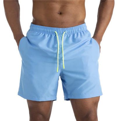 Raspberry Eurybia Sunga Beach Shorts swimwear with vibrant pattern and comfortable fit, designed for beach and poolside wear