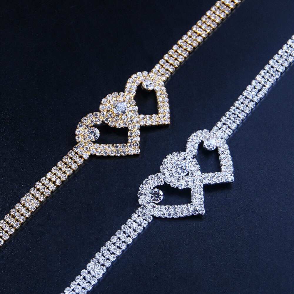Red Iphigenia double heart anklet bracelet for women, beach jewelry featuring delicate chain and charm details.
