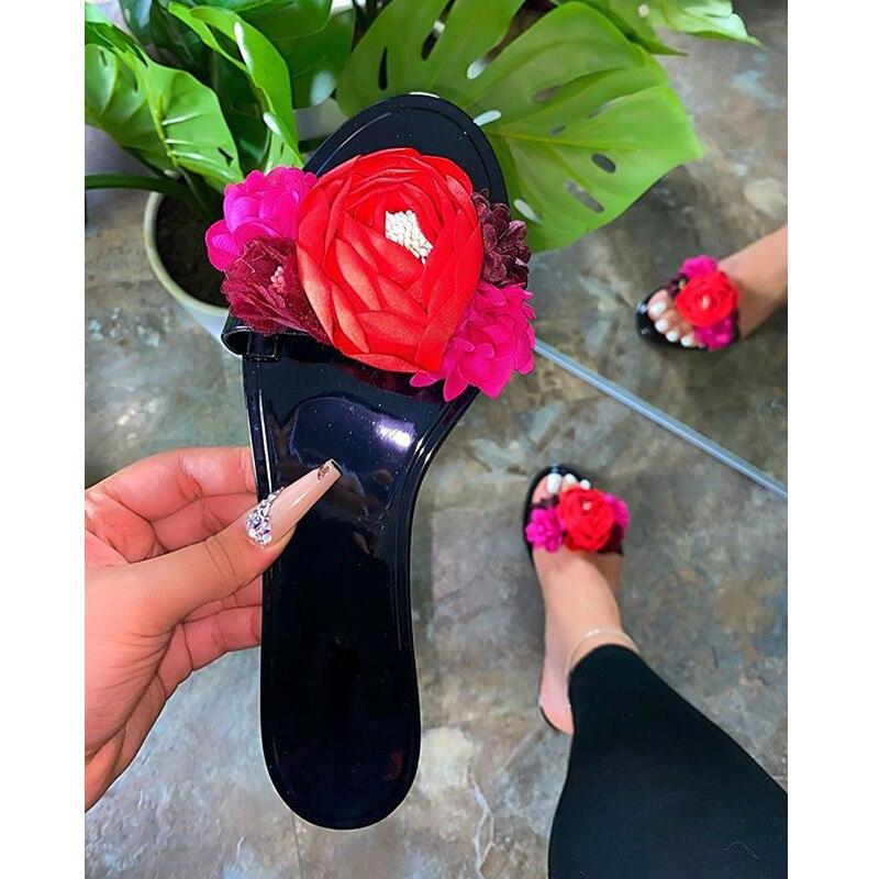 Transparent floral summer slippers for women by Coffee Jasper, featuring colorful flower designs perfect for beach or casual wear.