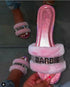 Pink faux fur slides from Silver Juneberry, stylish footwear with plush fur detailing for comfortable, trendy wear.