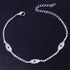 Vintage blue evil eye anklet bracelet by Red Iphigenia featuring crystal accents, perfect for beachwear and summer style.