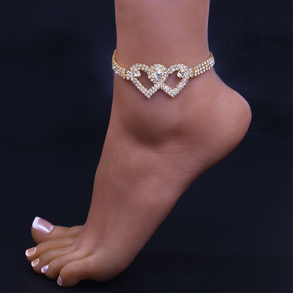 Red Iphigenia double heart anklet bracelet for women, beach-inspired jewelry with two heart charms on a delicate chain.