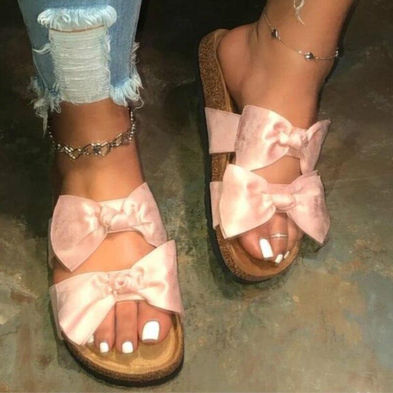Pink Silver Juneberry women’s slide sandals with two straps and a bow, featuring a comfortable design for casual wear.