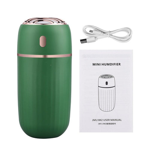Maroon Asteria 30ml wireless aromatherapy humidifier with essential oil diffuser for home improvement, showing the device and mist output.