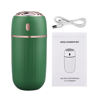 Maroon Asteria 30ml wireless aromatherapy humidifier with essential oil diffuser for home improvement, showing the device and mist output.