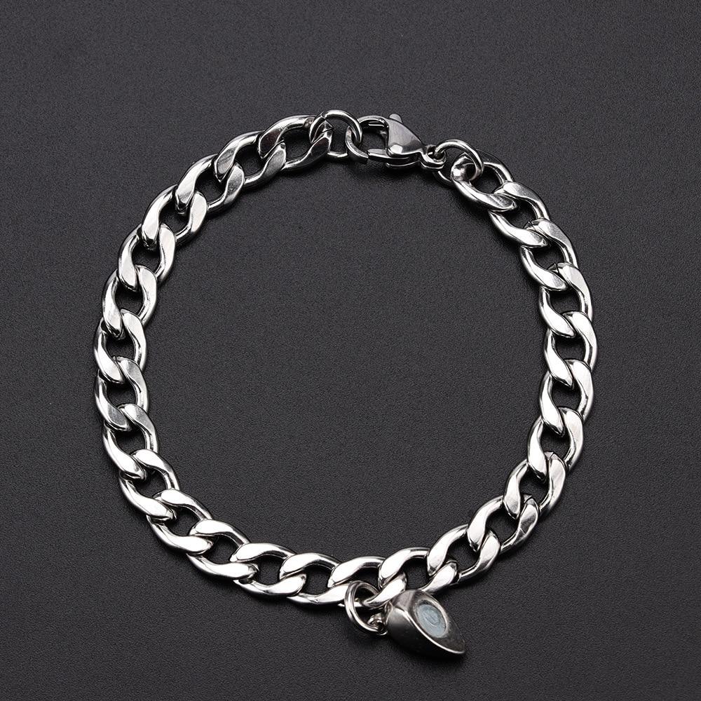 Silver Juneberry stainless steel couple bracelets with magnetism heart charms and Cuba chain design, perfect for romantic jewelry.