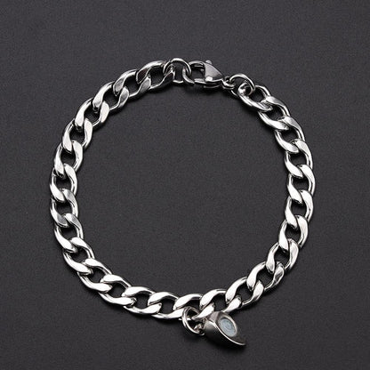 Silver Juneberry stainless steel couple bracelets with magnetism heart charms and Cuba chain design, perfect for romantic jewelry.