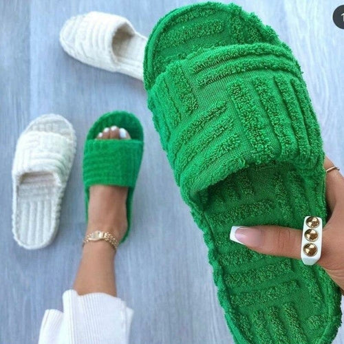 Silver Juneberry furry slippers for women, flat thick sole, cozy leisure footwear perfect for indoor or beach wear.