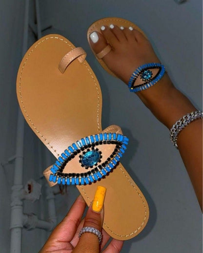 Coffee Jasper female rhinestone eyes slides with round toe flat slippers, featuring sparkling rhinestone embellishments.