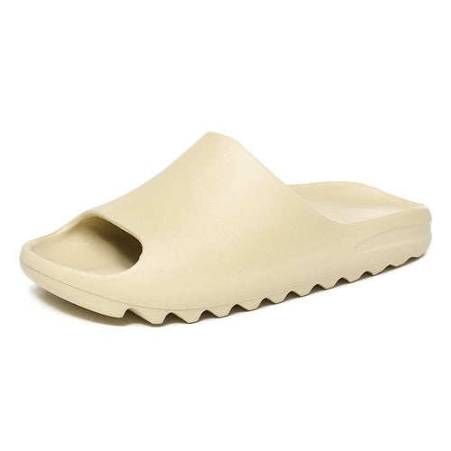Brown and khaki Yeezy-inspired slippers by Silver Juneberry, soft slip-on sandals with a casual design.