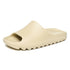 Brown and khaki Yeezy-inspired slippers by Silver Juneberry, soft slip-on sandals with a casual design.