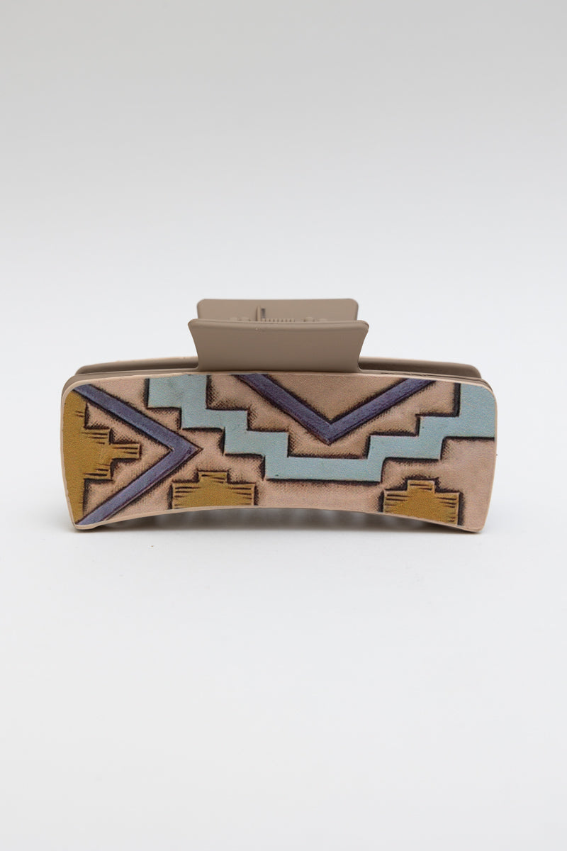 Western-style hair claw clip with geometric tribal pattern, designed by Periwinkle Aether, featuring a stylish accessory for hair styling.
