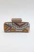 Western-style hair claw clip with geometric tribal pattern, designed by Periwinkle Aether, featuring a stylish accessory for hair styling.