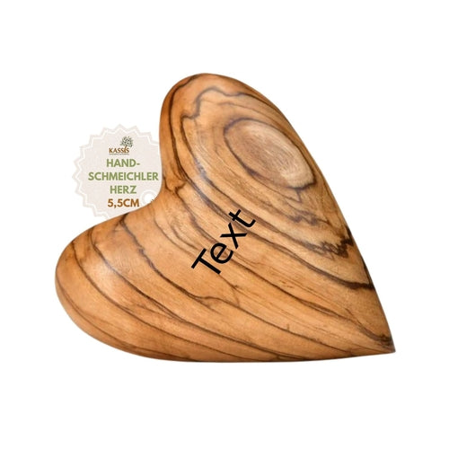 Personalized olive wood heart with engraving, hand-friendly design, ideal for home and garden decor by Coffee Arrowwood.