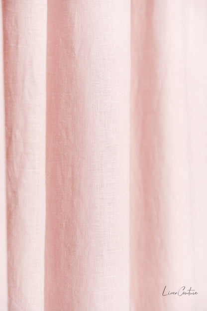 Pale pink linen curtain with tab top design from Magenta Sugarplum, ideal for home decor and window treatments.