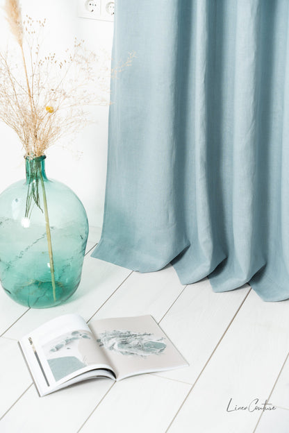 Greyish mint linen curtain with tab tops from Magenta Sugarplum, ideal for stylish home decor.
