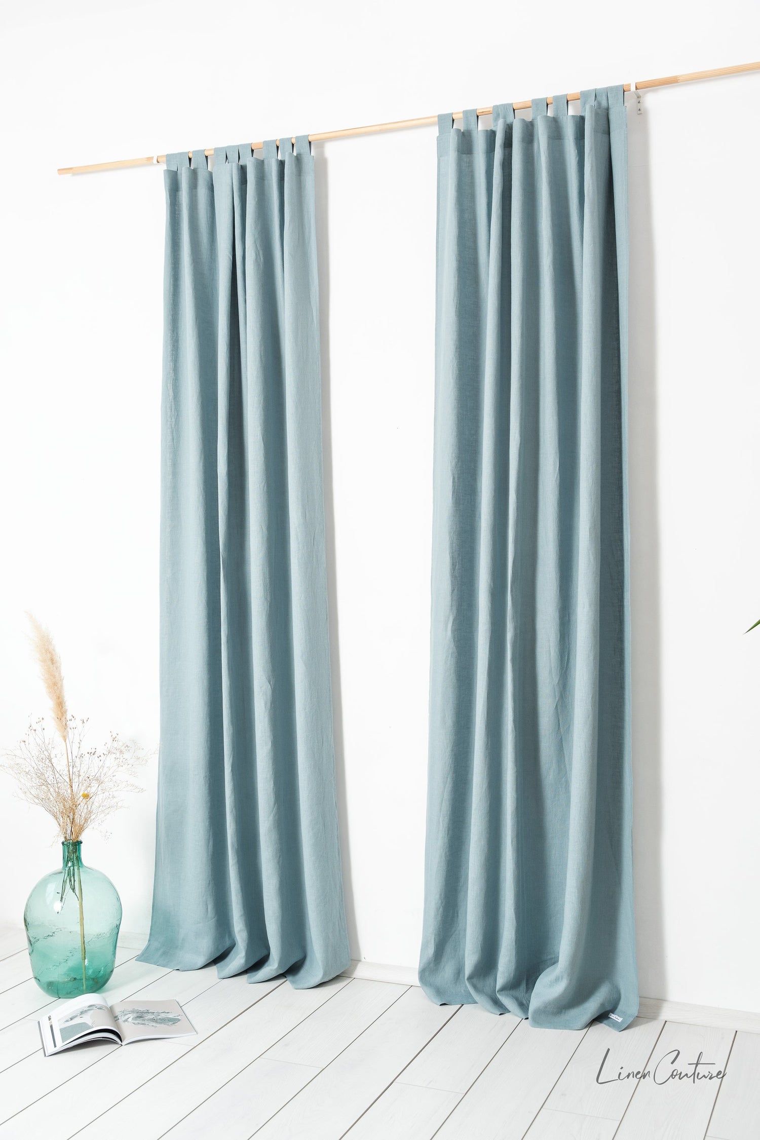 Greyish mint linen curtain with tab top from Magenta Sugarplum, ideal for home decor and window treatment.
