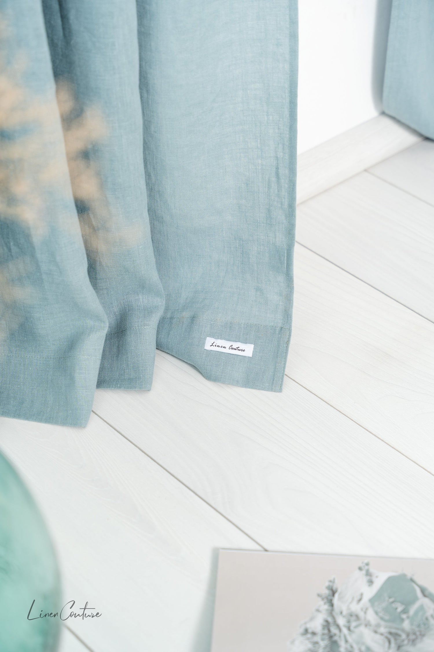 Greyish mint linen curtain with tab top design from Magenta Sugarplum, ideal for stylish home decor.