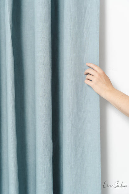 Greyish mint linen curtain with tab top design from Magenta Sugarplum, ideal for stylish home decor.