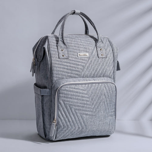 Maroon Chronos quilted diaper baby backpack with multiple compartments and adjustable straps, designed for parent convenience.
