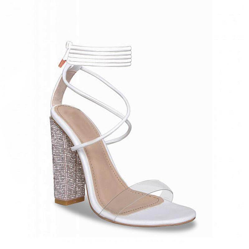 Silver Juneberry white transparent open-toed high-heeled sandals with thick heels and clear straps, stylish and modern footwear.